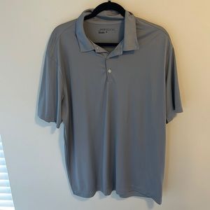 Nike Golf Dri Fit polo with GraybaR logo on right sleeve